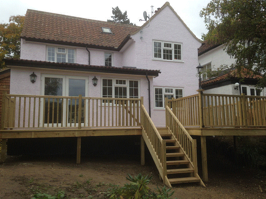 Outside family area next to kitchen. House repainted.